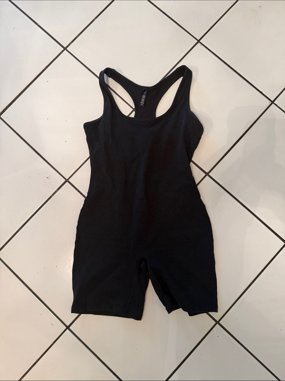 SKIMS Black Racerback One-Piece Bodysuit